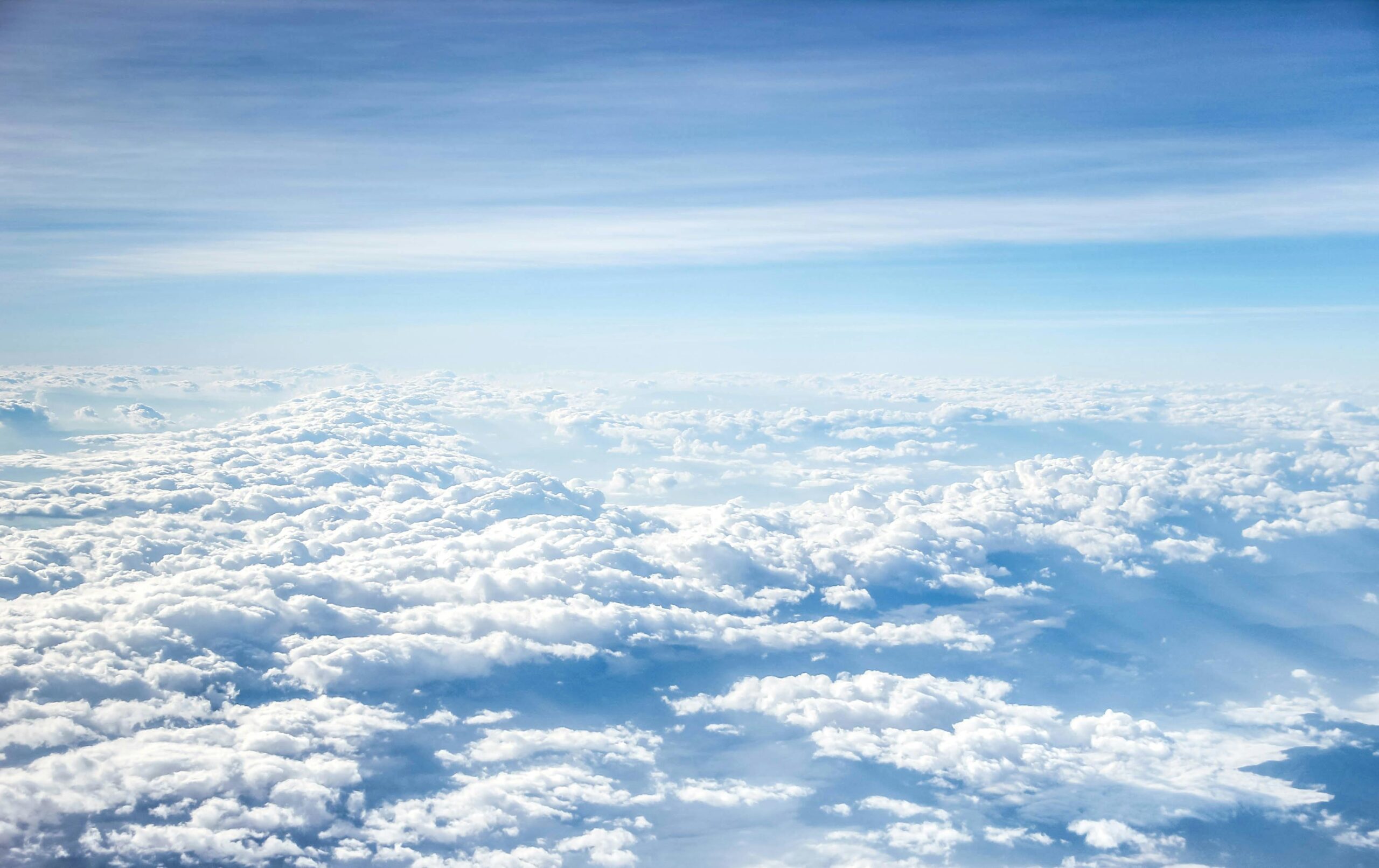 notary and dispute A pool of thick white clouds under the blue sky.