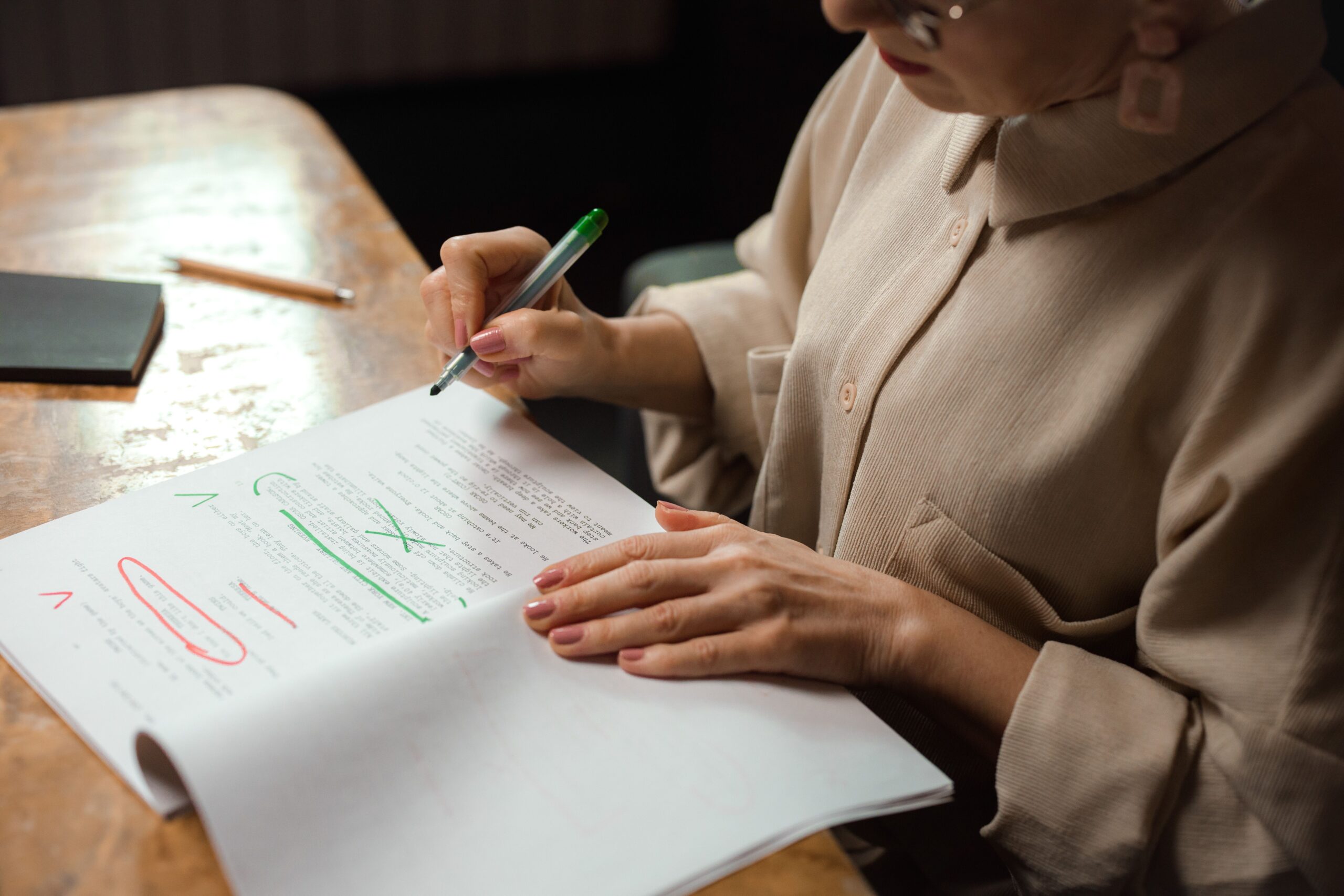 Woman reviewing and correcting errors in a trust deed