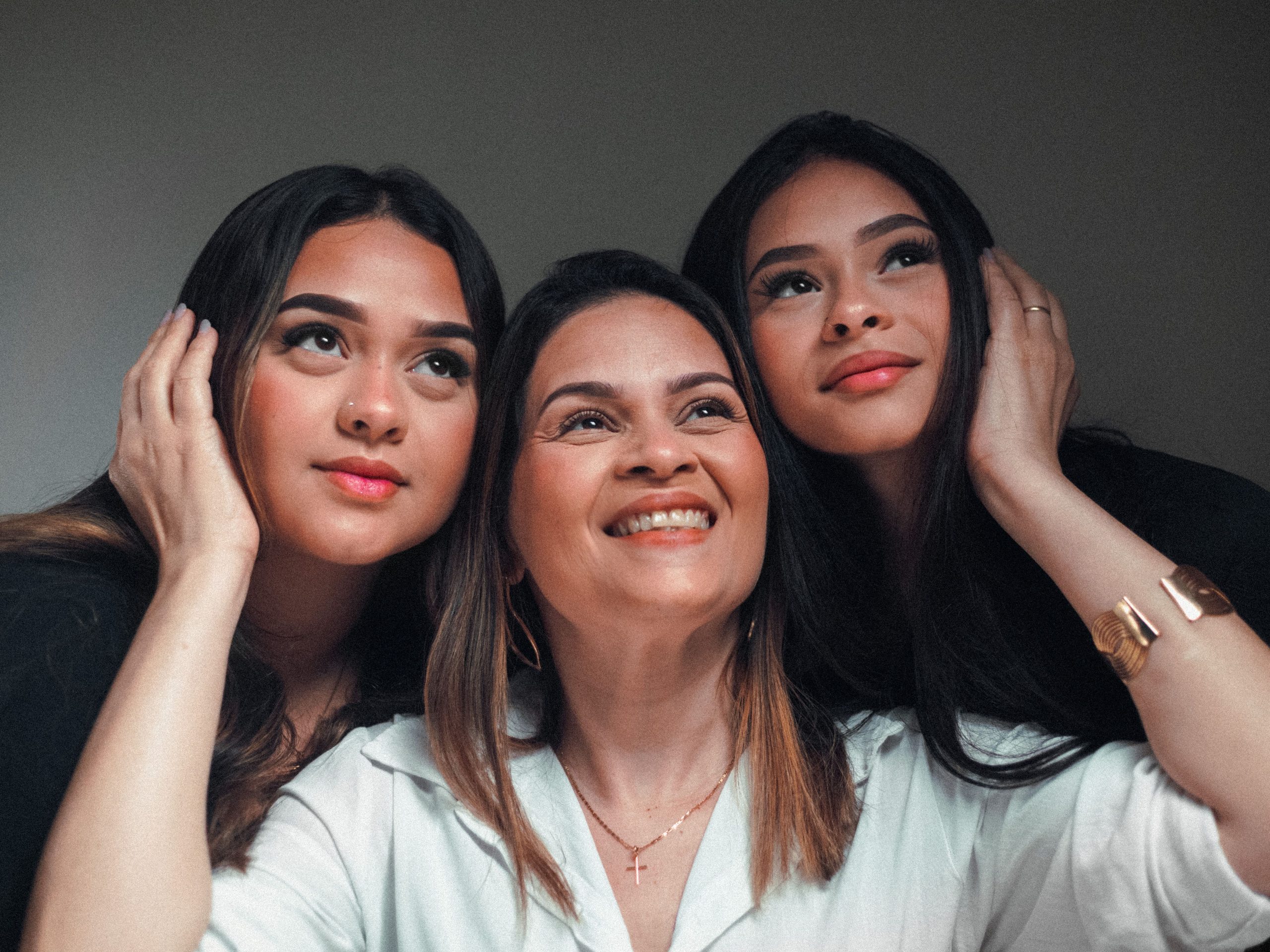 Mother and daughters representing family inheritance planning and the Guardian's Fund South Africa.
